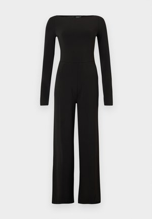 Combinaison noire à manches longues et jambes larges, avec une taille cintrée et un col bateau, présentée sur un fond clair uni.