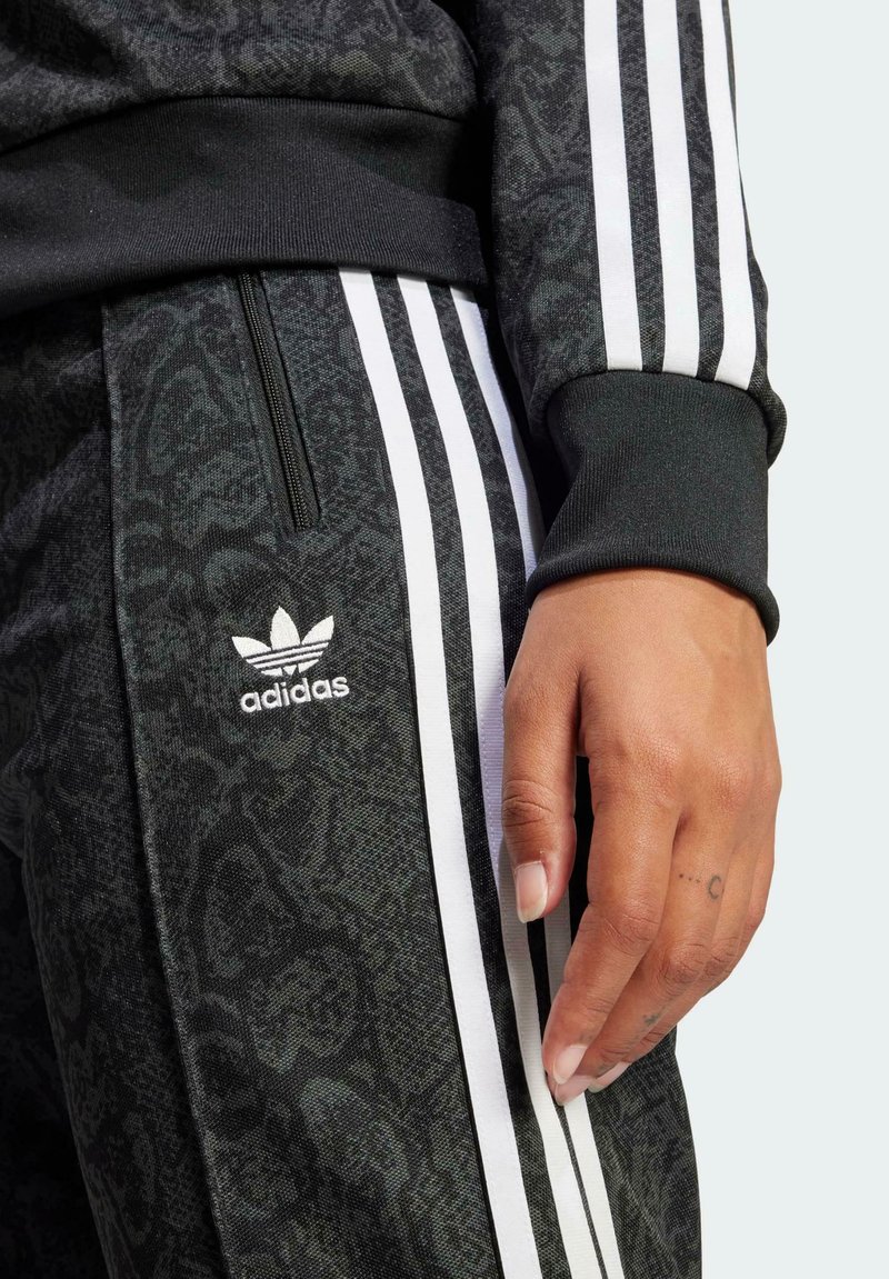 adidas Originals SNAKE - Tracksuit bottoms - black/multicolor/black -  Zalando.ie