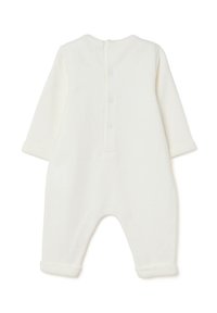 Monosie de bebé de forro polar blanco con mangas largas, cuello redondo y cierre de botón en la parte posterior. Mangas y tobillos con puños para mayor comodidad.