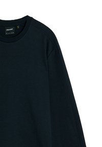 Felpa in cotone blu navy con maniche lunghe, scollatura rotonda e polsini a coste. Presenta un design minimale e un'etichetta che mostra il nome del marchio.