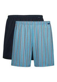 Deux paires de boxers : l'une unie bleu marine et l'autre avec des rayures verticales bleues et blanches, accentuées de lignes rouges et oranges. Tissu doux et extensible.