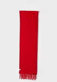 Red wool scarf with fringed edges, featuring a soft, textured finish and a small brand tag near the bottom.