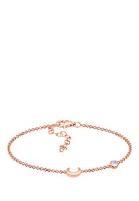 Armband i roséguld med en halvmåneberlock och en rund månsten, med en krabbklämma och justerbar kedja.