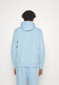 Calvin Klein Golf PLANET SPORTS SUIT - Trenirka - air blue