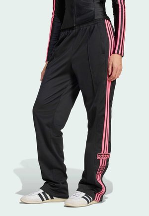 BREAK  - Tracksuit bottoms - black lucid pink