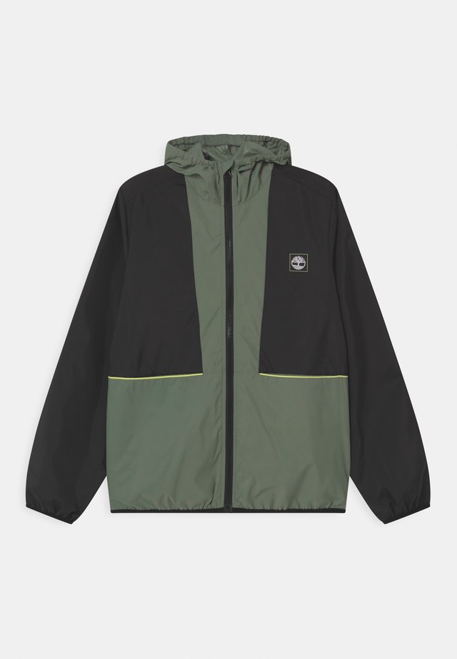HOODED WINDBREAKER - Übergangsjacke - green