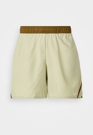 Light green shorts featuring a diamond pattern, elastic brown waistband, and side accents. Made of breathable fabric for comfort.