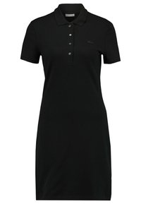 Robe polo noire à manches courtes avec col, quatre boutons et un petit logo brodé sur la poitrine gauche.