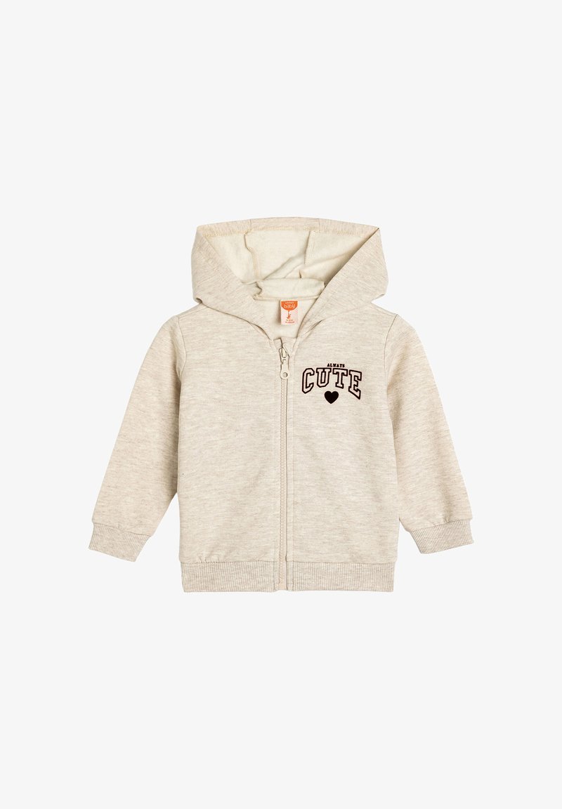 Sudadera beige para niños pequeños con cremallera frontal, capucha y texto "Siempre Bonita" con un corazón en el pecho.