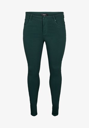 Zelene uske traperice napravljene od rastezljivog traper materijala, s klasičnim dizajnom s pet džepova, petljama za remen i zatvaranjem na patentni zatvarač.