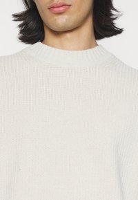 BOSS Strickpullover - open white