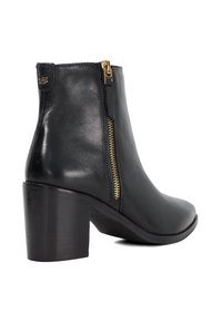 Black leather ankle boot with a side gold zipper, rounded toe, and a chunky heel. Smooth texture with minimal design details.