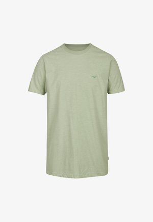 T-shirt verde chiaro a maniche corte con scollo rotondo e piccolo logo di uccello verde scuro sul petto sinistro e una etichetta sulla cucitura laterale sinistra.