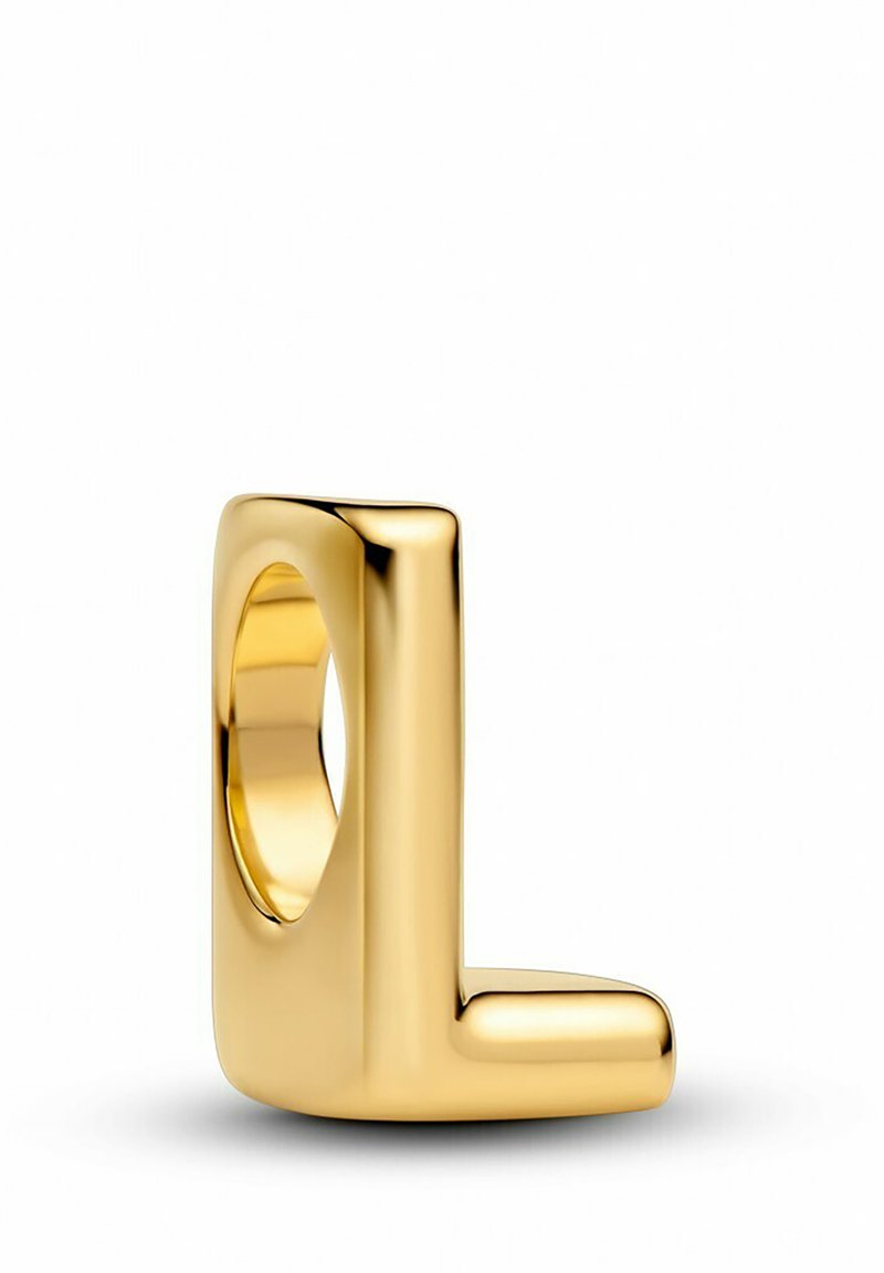 Bague en or au design géométrique en forme de L. Surface lisse avec une finition polie, présentant un centre creux et un style minimaliste.