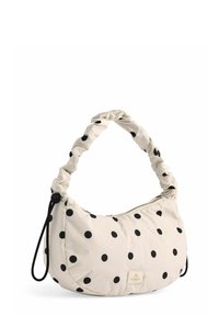 Beige polkadot håndtaske lavet af stof med en blød, struktureret overflade; har et rynket, polstret håndtag og en lynlåslukning.