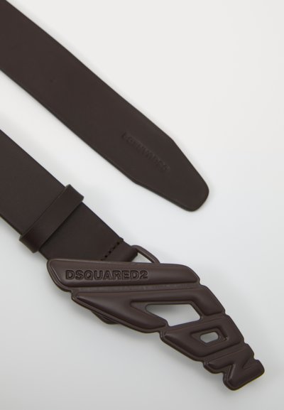 Brown rubber belt featuring a bold, raised "DSQUARED2" logo buckle. The strap is smooth with a matte finish.