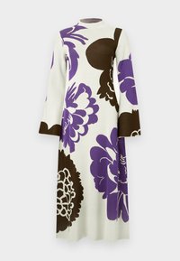 Long-sleeve dress in white, featuring large purple and dark brown floral patterns. Simple crew neckline, made of soft fabric with a smooth texture.