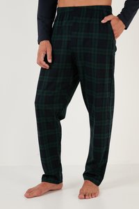 Pantaloni de pijama cu carouri verzi și bleumarin, confectionați dintr-un material moale, având un elastic la talie și buzunare laterale. Croială dreaptă cu o potrivire lejeră.