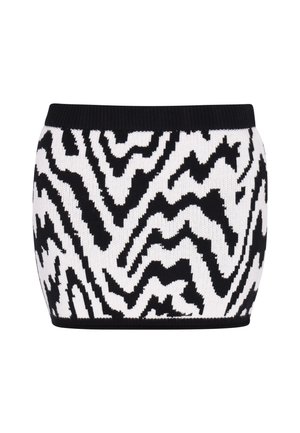 Falda de punto en blanco y negro con un patrón en zigzag, de diseño ajustado y con una cinturilla acanalada que proporciona estructura y soporte.