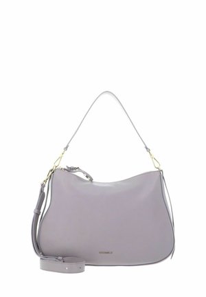 Lavendelfarbene Leder-Umhängetasche mit abnehmbarem, verstellbarem Schulterriemen, goldfarbenen Beschlägen und Reißverschluss, minimalistisches Design.