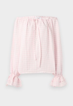 Bluse med bar ryg i lyserødt gingham-mønster, med flæseærmer og snor i halsudskæringen. Letvægtsstof.