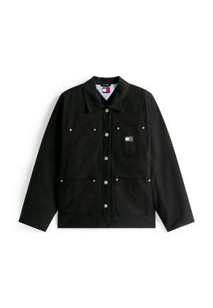 Black canvas jacket with a collared neckline, two front pockets, snap buttons, and a small branded patch on the chest.