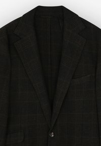 Blazer a cuadros marrón oscuro con solapa de muesca, cierre de un botón y un bolsillo en el pecho. Tejido texturizado con una silueta estructurada.