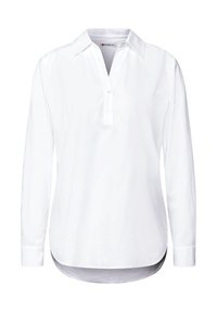 Chemise blanche à manches longues avec un col, patte de boutonnage et ourlet arrondi. Fabriquée en tissu léger, elle présente une texture lisse.