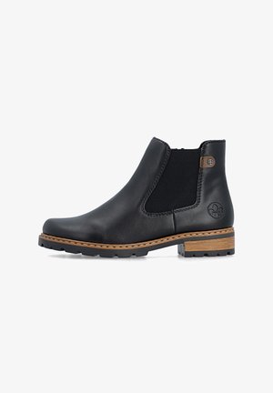 Bottine en cuir noir avec panneaux latéraux élastiques, semelle cousue marron, petit talon en bois et bout rond.