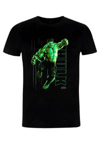 Černé tričko s grafiku zeleného Hulka, zobrazuje svalnatou postavu v akci, vedle níž jsou tučná písmena "HULK".