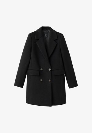 Czarny płaszcz z mieszanki wełny z dwurzędowym zapięciem, wyciętym kołnierzem, dwoma bocznymi kieszeniami i metalowymi guzikami. Zachowuje wyraźnie zarysowaną sylwetkę.