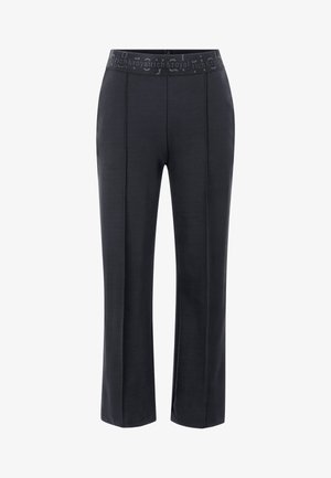 Black athletic pants with a wide waistband featuring a subtle logo. Smooth texture and straight leg design. Mid-rise fit.