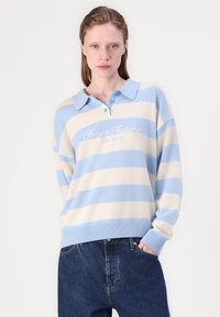 Blue and beige striped sweater with a collared neckline, featuring a stitched logo. Soft texture, ribbed cuffs, and hem. Casual fit.
