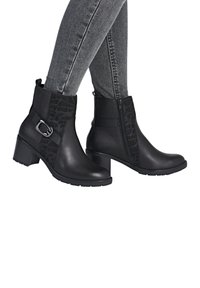 Remonte Bottines à plateau - schwarz