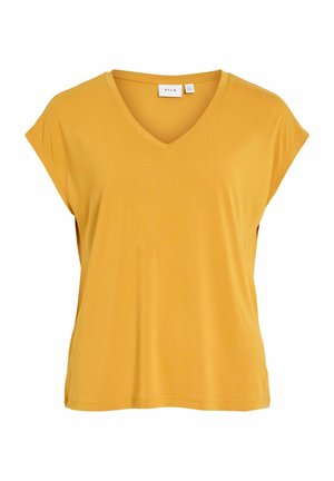 Blouse jaune à manches courtes et col en V, coupe ample et petite étiquette de marque au niveau de l'encolure.