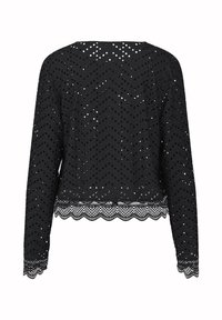 Top nero a maniche lunghe con intricati motivi a taglio, design a zigzag e bordi in pizzo scallopato all'orlo e ai polsini.