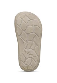 Schoenloopzool met een gestructureerd patroon en duidelijke profiel, in lichtbeige met "NATURINO" en "20" verdiept op de onderkant.
