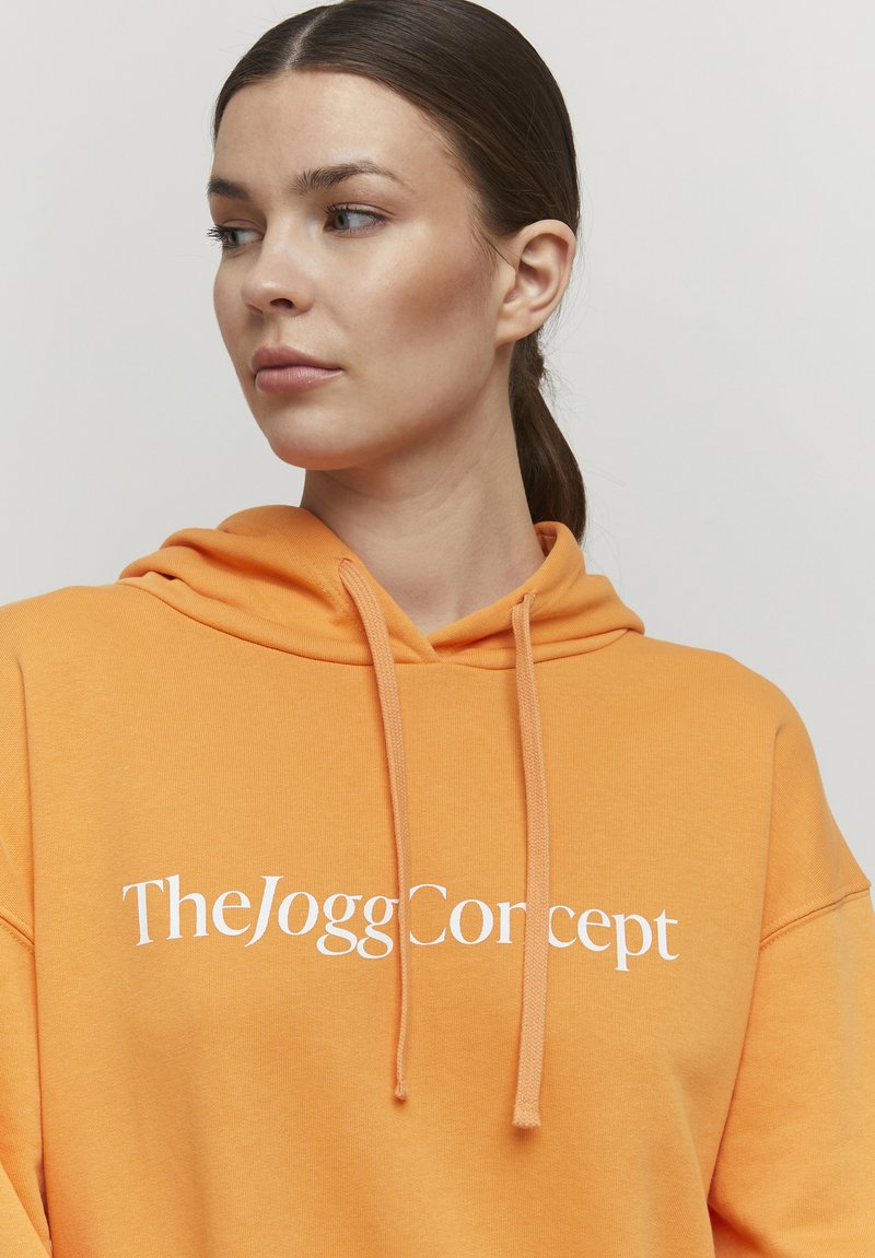 Damen Freizeitkleider | TheJoggConcept JCSAFINE Jerseykleid muskmelon/orange - UC14998 Damen Freizeitkleider | TheJoggConcept JCSAFINE Jerseykleid muskmelon/orange - UC14998
