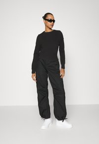 JDY JDYPRIME LIFE O NECK - Stickad tröja - black