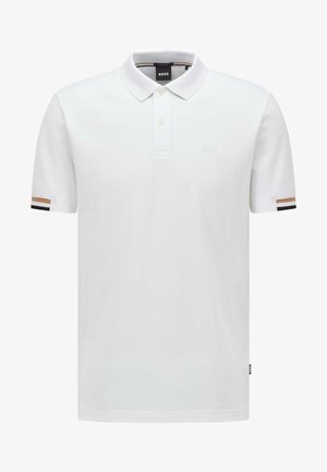 Polo bianco con colletto classico, pattina con tre bottoni e maniche corte con accenti a strisce nere, marroni e bianche sui polsini.