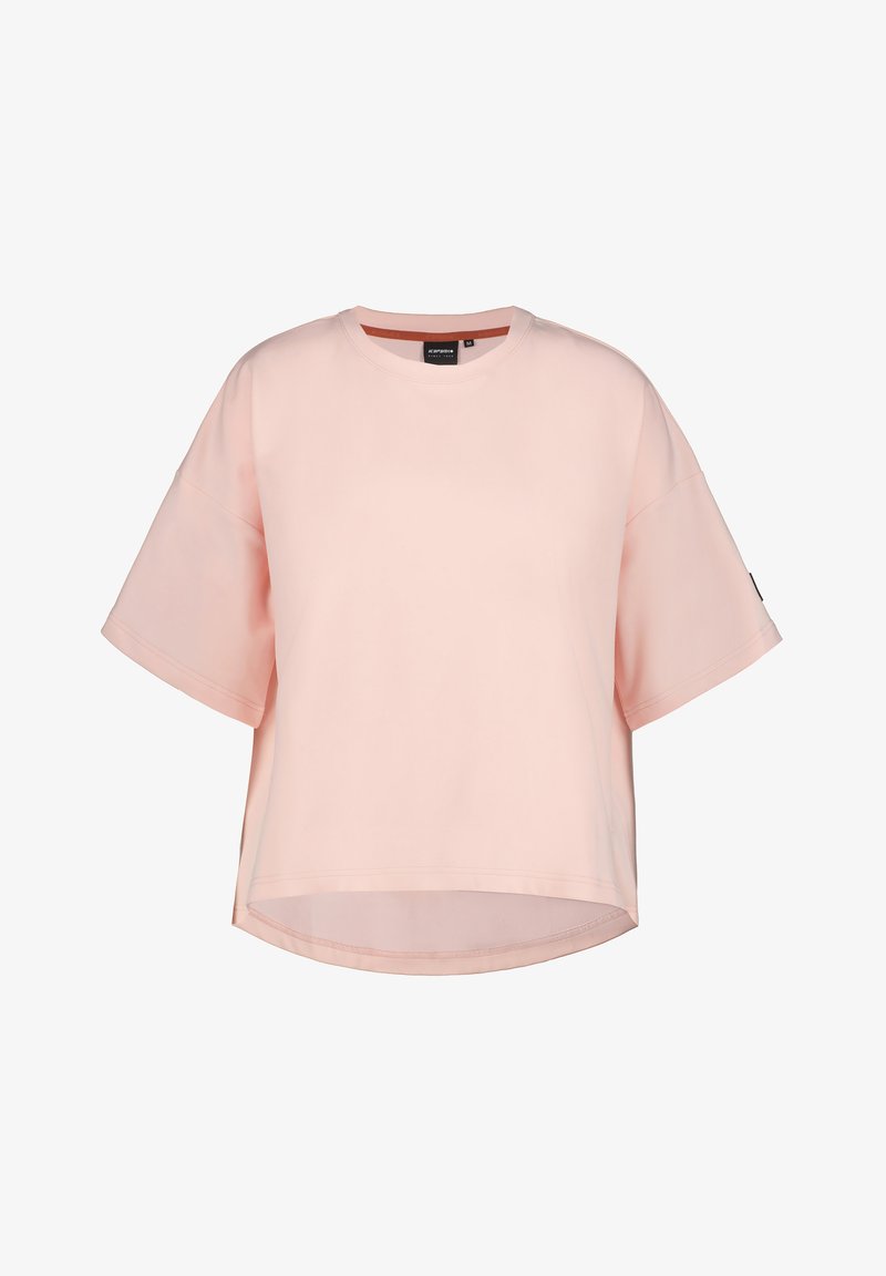 Vaaleanpunainen lyhythihainen oversized t-paita, joka on valmistettu pehmeästä kankaasta. Ominaisuuksiin kuuluu pyöreä pääntie ja kaareva helma, jossa on sivuhalkiot.