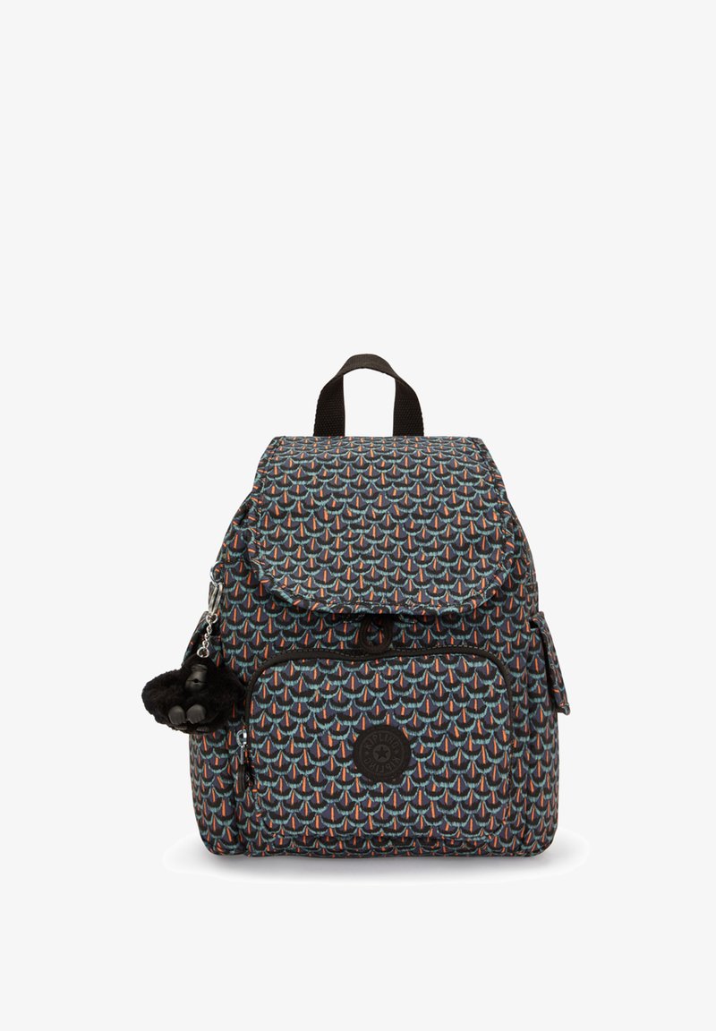 Multicolored patterned backpack with a flap closure, front zip pocket, logo patch, and a plush accessory attached. Made from durable fabric.