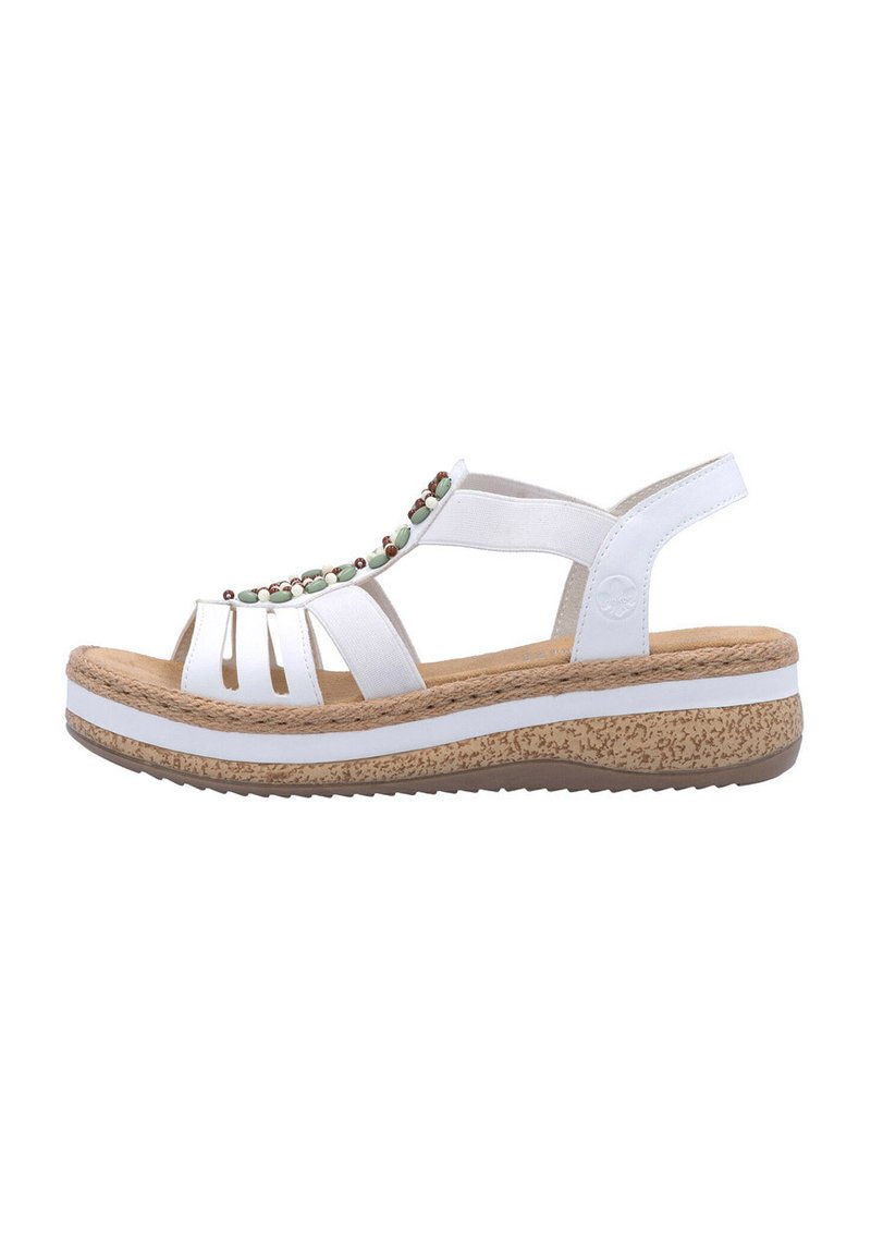 Sandalo bianco con numerose cinghie superiori, perline decorative e suola in sughero a zeppa. Base testurizzata con una combinazione di colori bianco e marrone chiaro.