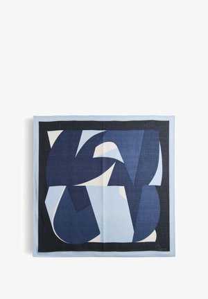 Silk scarf featuring a geometric design in dark navy, light blue, and cream, with a solid blue border and a signature in the corner.