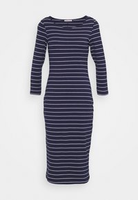 Laivastonsininen raidallinen mekko pitkillä hihoilla, jossa vaakasuoria valkoisia raitoja, pyöreä pääntie ja vartalonmyötäinen siluetti.