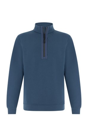 Sininen puolivetoketjullinen collegepaita korkealla kauluksella, pitkät hihat ja resorireunukset. Sileä pinta, jossa on vähän saumoja ja vetoketjullinen taskudetaili.