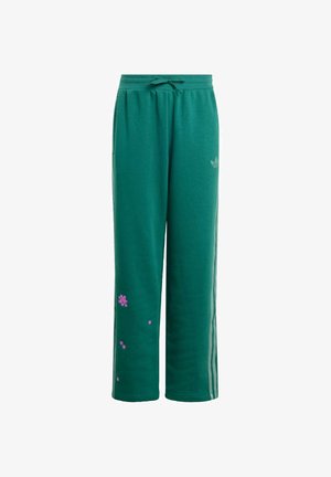 Green Adidas track pants with light green side stripes, a drawstring waist, and small pink pixelated designs on the lower left leg.