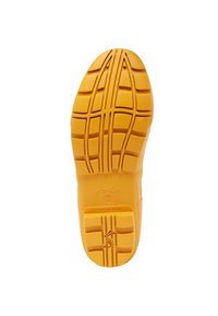 Suela amarilla de zapato de goma con patrones de relieve profundos, superficie texturizada y nombre de marca embossado. Diseñada para ofrecer agarre y durabilidad.