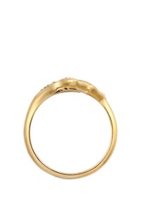 Goldring mit einer glatten, polierten Oberfläche und gerundeter Form. Verfügt über kleine dekorative Akzente entlang des oberen Randes.