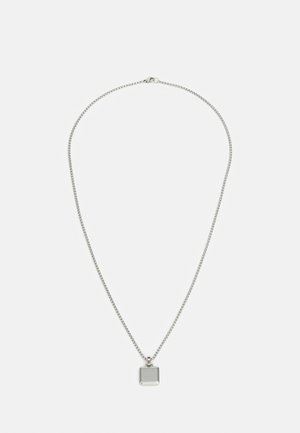 Silver chain necklace featuring a square pendant with a polished surface and rounded edges, complemented by a small multicolored accent.